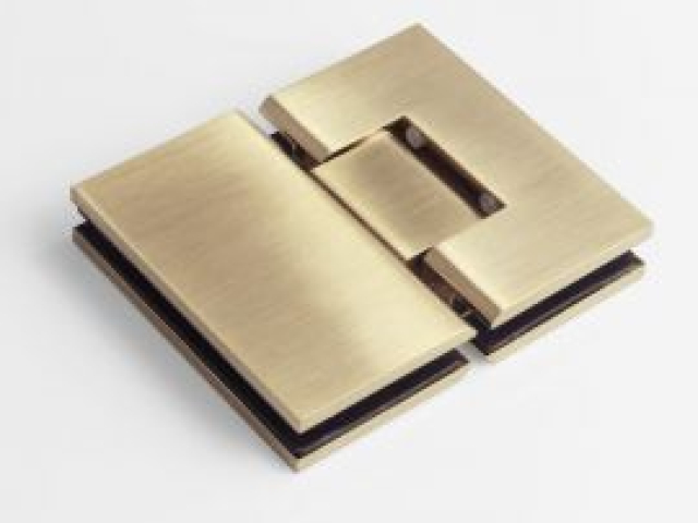 Brushed brass glass to glass hinge for frameless doors - glasscapes